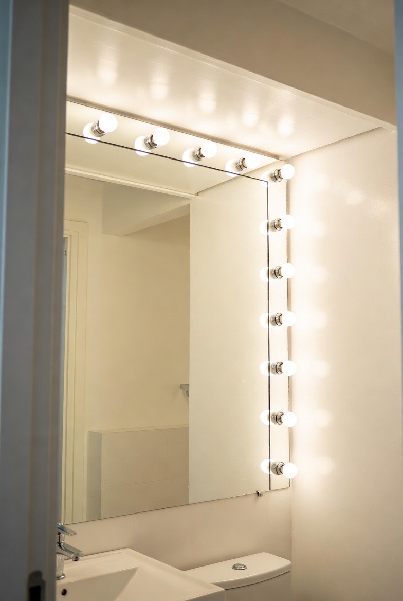 Making Small Bathrooms Feel Larger with Mirror Lighting